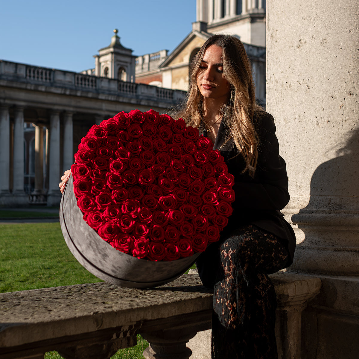 85-100 Roses in Super Deluxe Round Grey Suede Rose Box