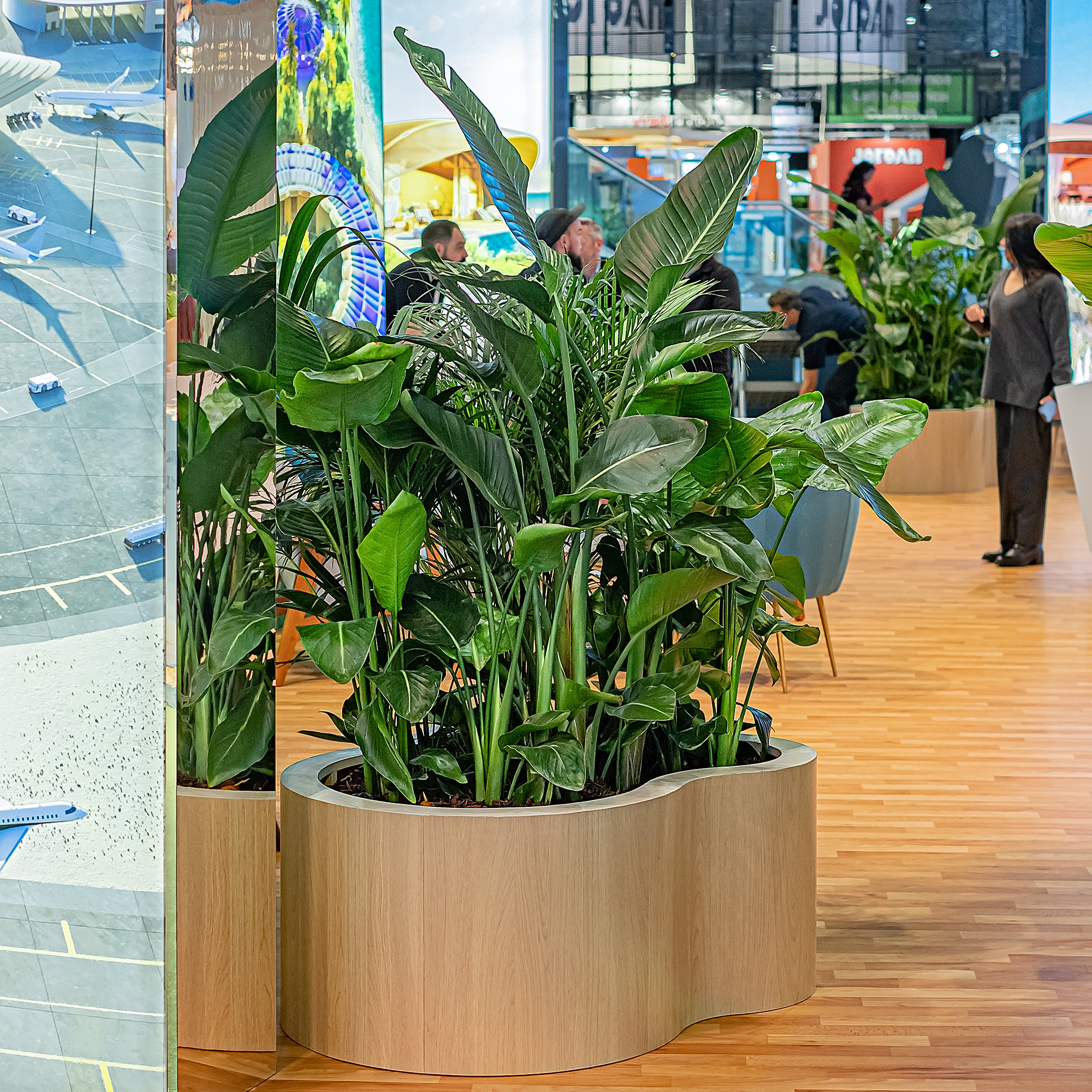 Irregular shaped, stylished planters arrangement by Amaranté London at WTM London for Red Sea Global's exhibition space.