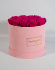 Expressive hot pink Roses in a magical pink box 